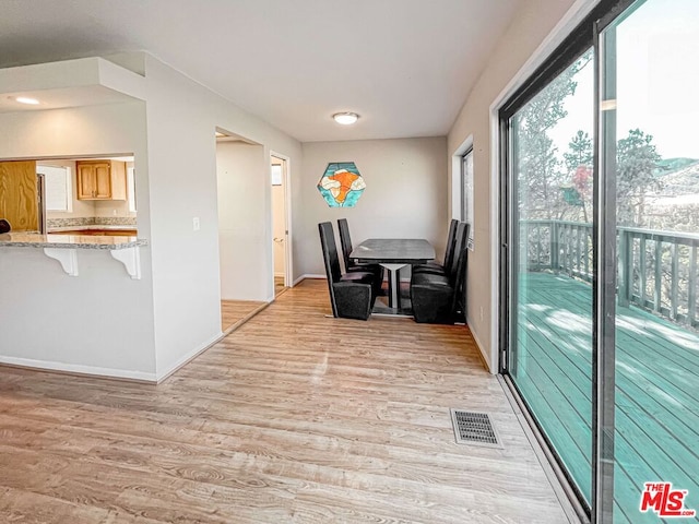 dining area featuring light hardwood / wood-style floors