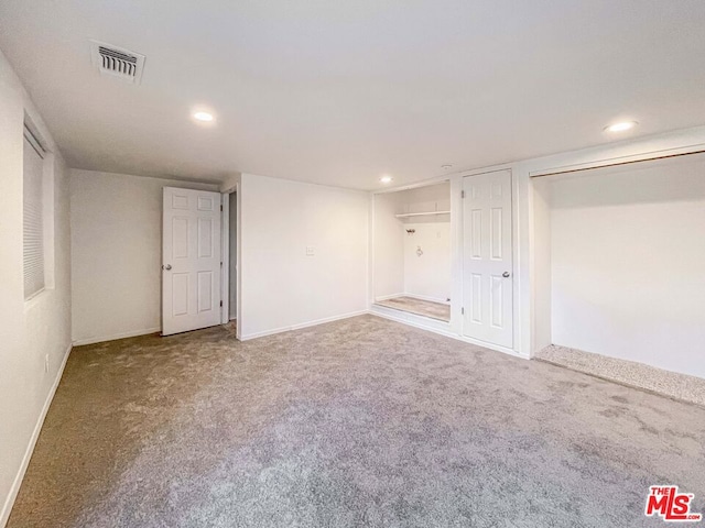 basement with carpet flooring