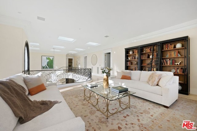 living room with ornamental molding