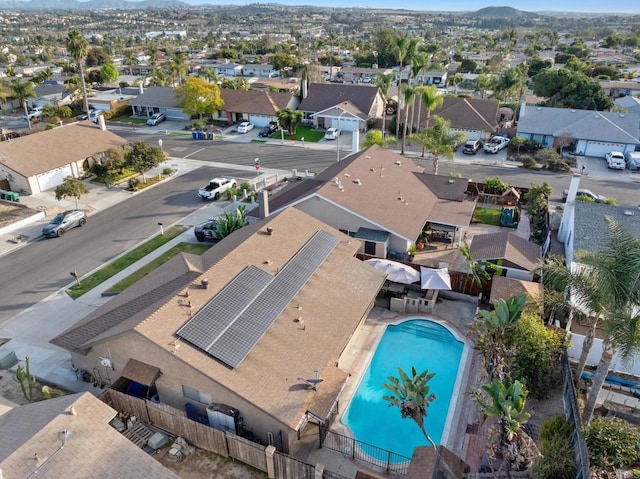 birds eye view of property with a residential view