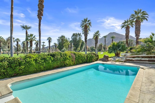 view of pool featuring a mountain view