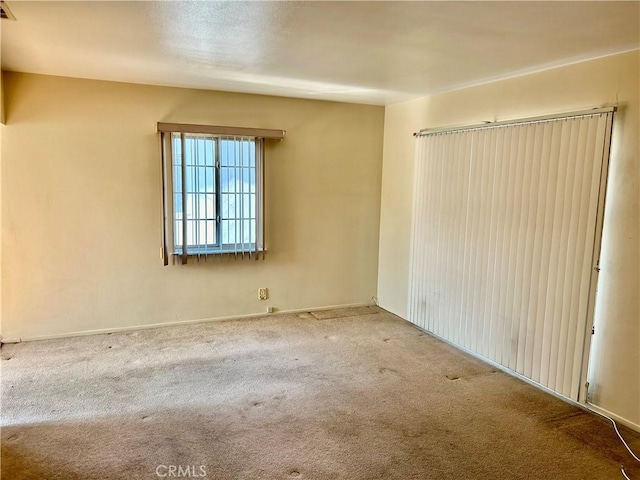 empty room with carpet flooring