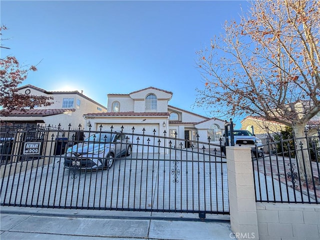 view of gate with a garage