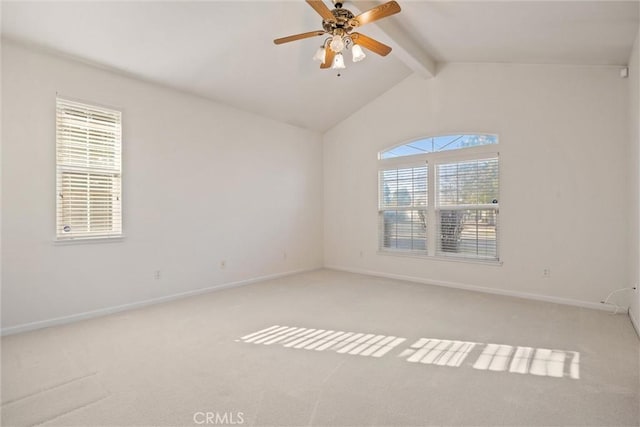 carpeted spare room featuring ceiling fan and lofted ceiling with beams