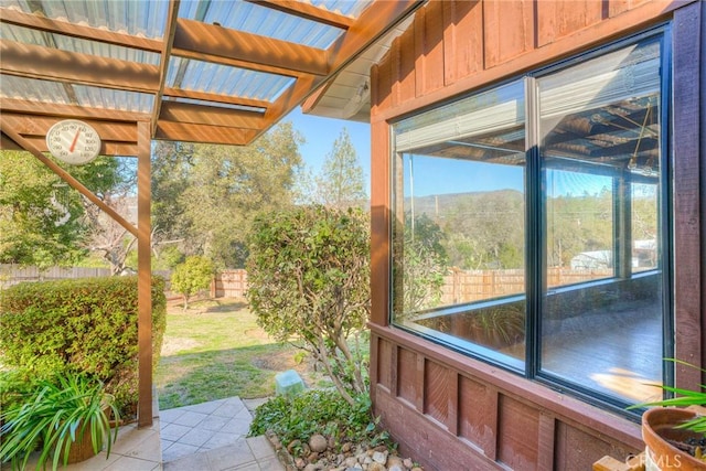 exterior space featuring vaulted ceiling and a wealth of natural light