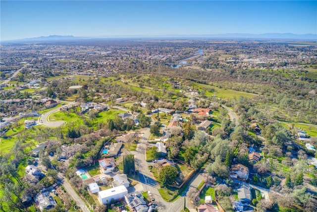 birds eye view of property with a mountain view