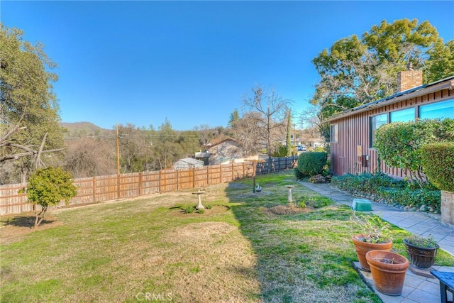 view of yard with a mountain view