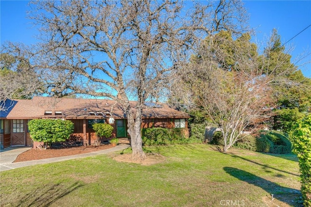 view of front of home with a front yard