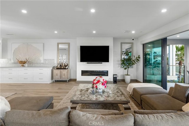 living room with light wood-type flooring