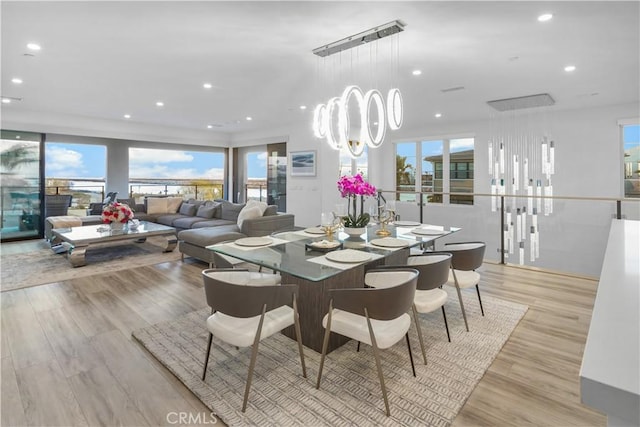 dining room with light hardwood / wood-style flooring