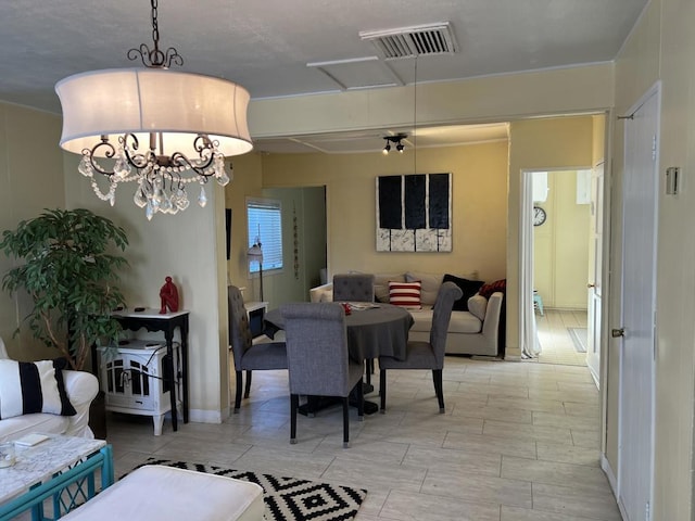 dining area with a chandelier