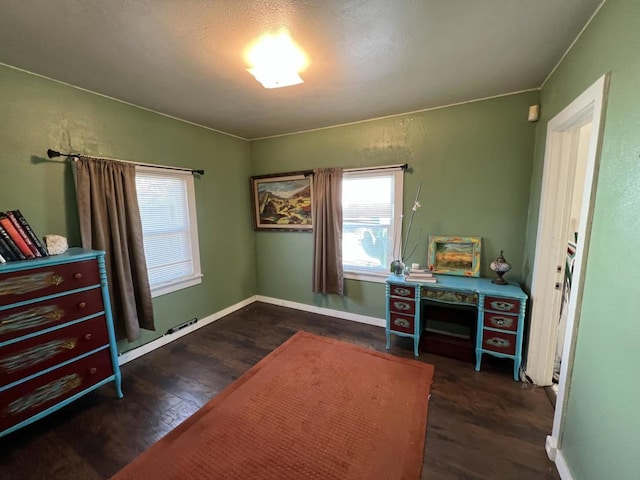 office with dark hardwood / wood-style floors