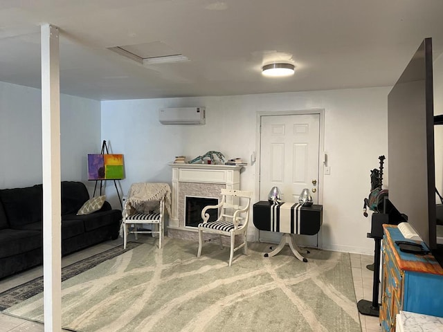 interior space featuring a stone fireplace, an AC wall unit, and light tile patterned flooring