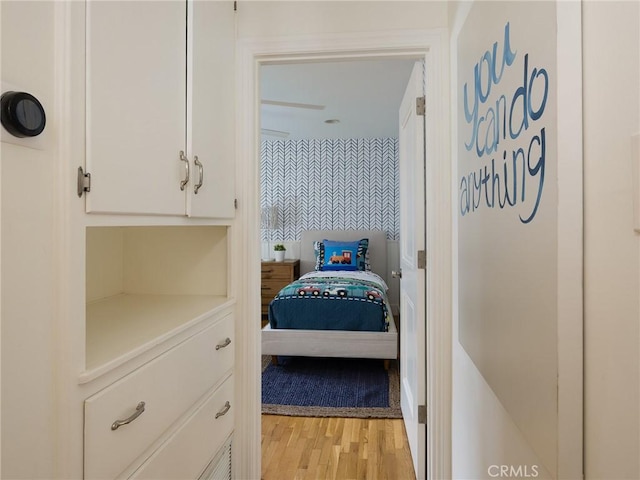 bedroom featuring light wood-type flooring