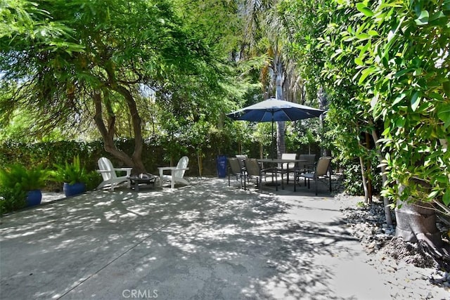 view of patio / terrace featuring a fire pit