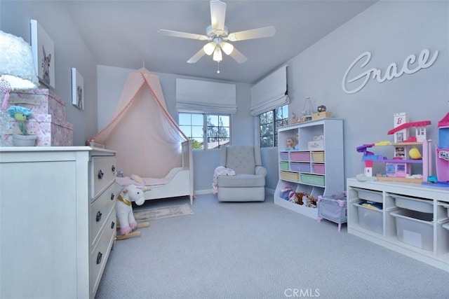 carpeted bedroom featuring ceiling fan