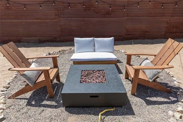 view of patio / terrace featuring a fire pit