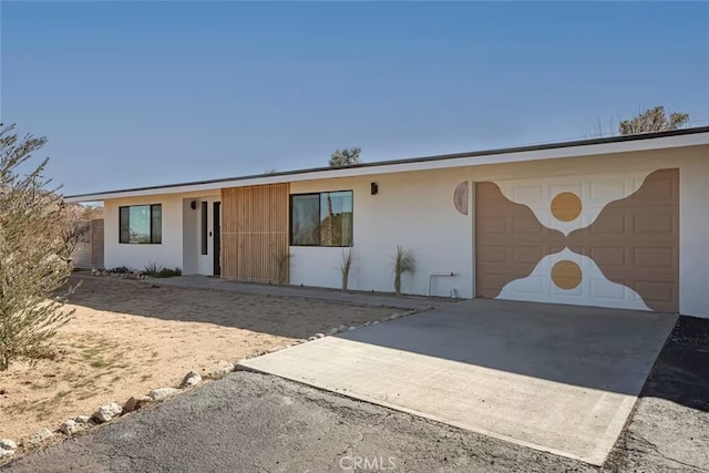 ranch-style house with a garage