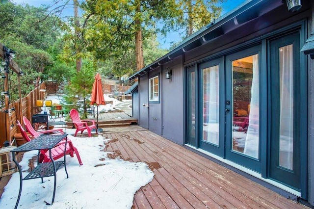 view of snow covered deck