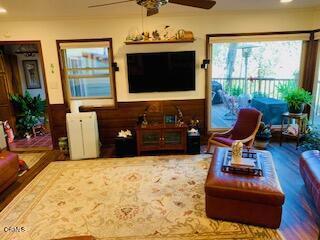 living room featuring ceiling fan