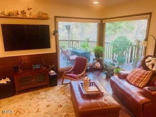 living room with a wealth of natural light and wood-type flooring