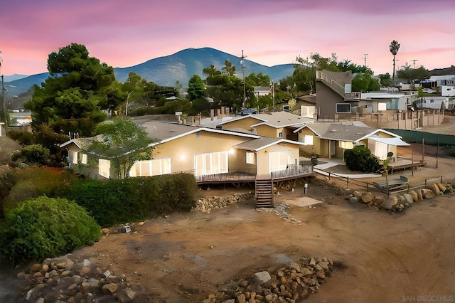 view of front of home featuring a mountain view