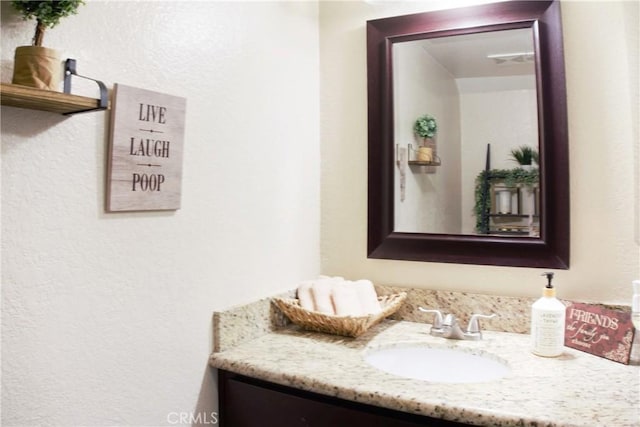 bathroom featuring vanity