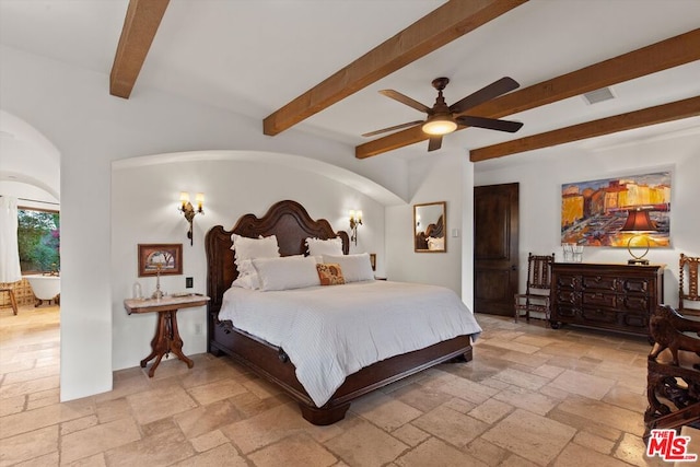 bedroom with beam ceiling and ceiling fan