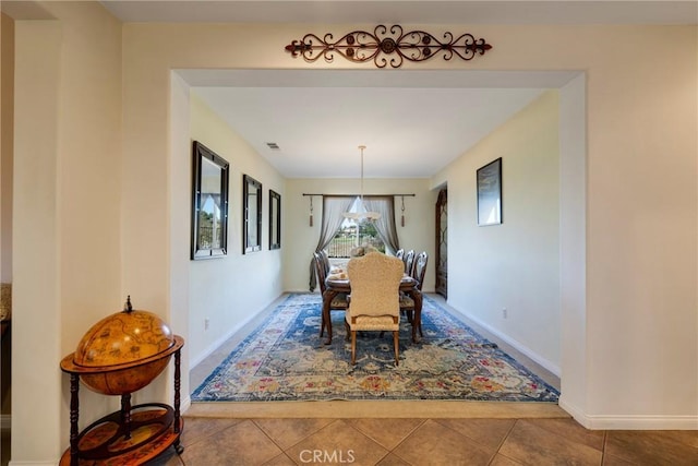 view of tiled dining space