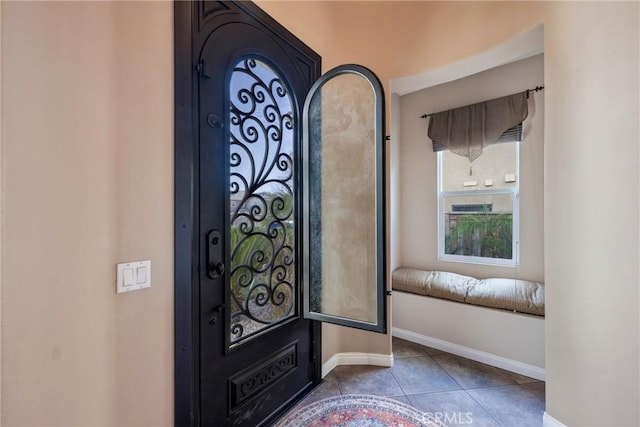 foyer entrance featuring tile patterned floors