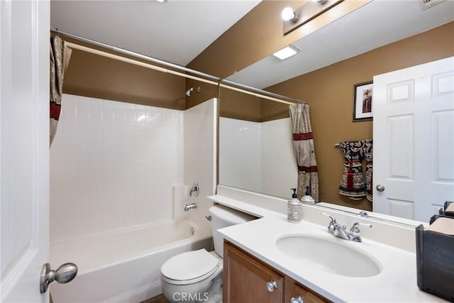 full bathroom featuring toilet, vanity, and shower / tub combo