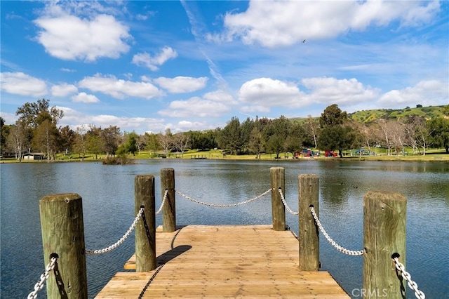 dock area featuring a water view