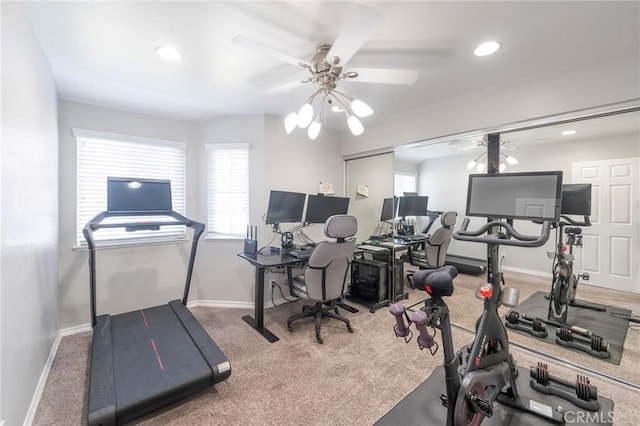 exercise area featuring carpet floors and ceiling fan