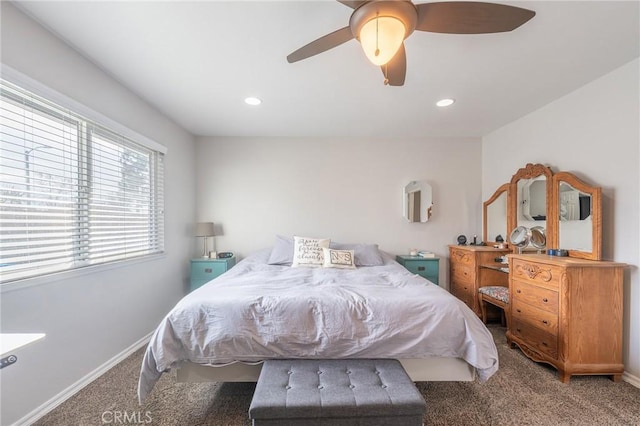 bedroom with ceiling fan and carpet