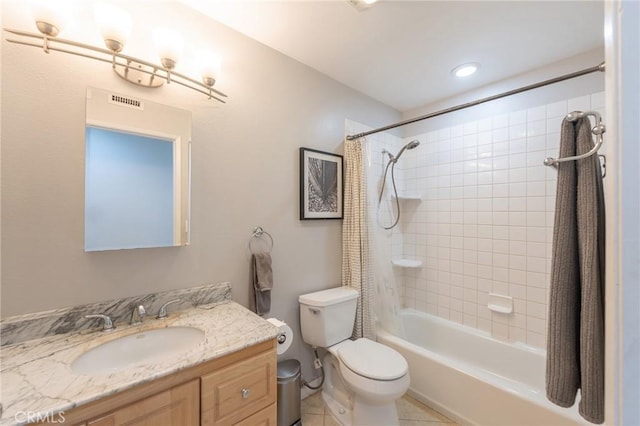 full bathroom with tile patterned flooring, vanity, shower / bathtub combination with curtain, and toilet