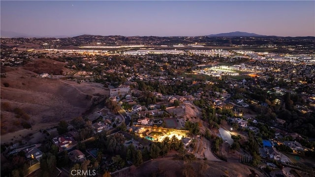 aerial view at dusk with a mountain view