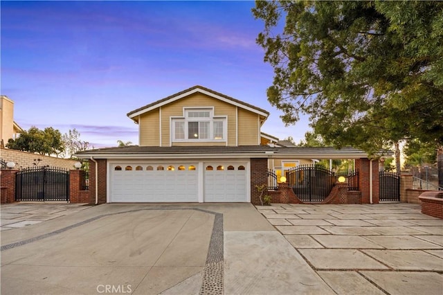 front of property with a garage