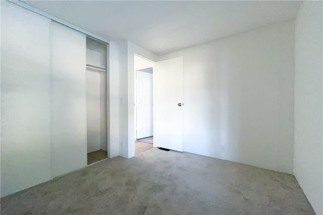 unfurnished bedroom featuring a closet