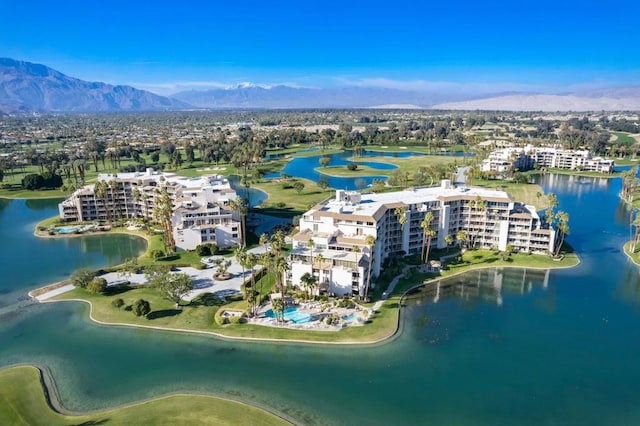 birds eye view of property featuring a water and mountain view