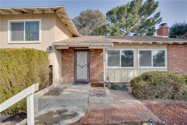 doorway to property featuring a patio