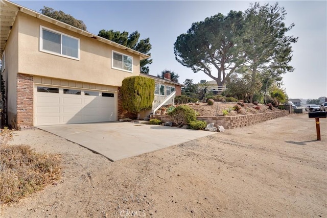 front of property featuring a garage