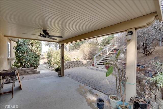 view of patio / terrace featuring ceiling fan