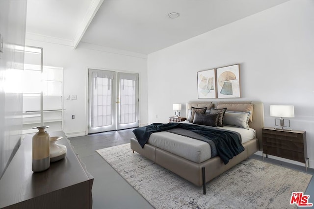 bedroom featuring french doors, beamed ceiling, concrete floors, and access to outside