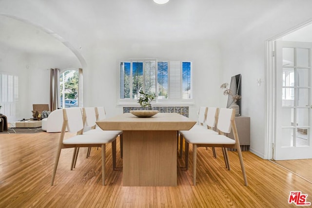 dining room with light wood-type flooring