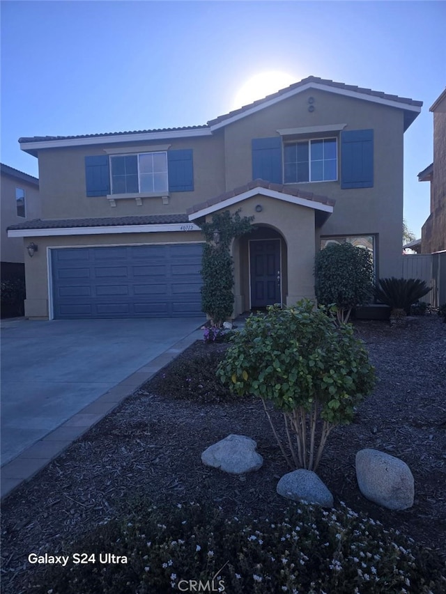 view of property featuring a garage