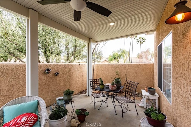view of patio / terrace with ceiling fan
