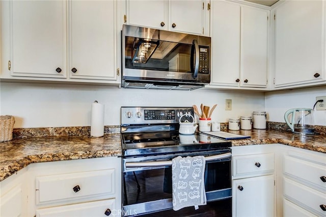 kitchen with white cabinetry and appliances with stainless steel finishes