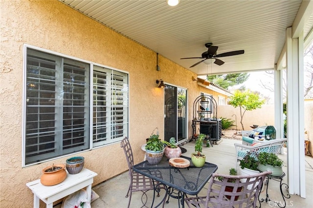 view of patio with ceiling fan