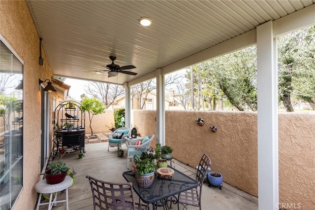 view of patio with ceiling fan