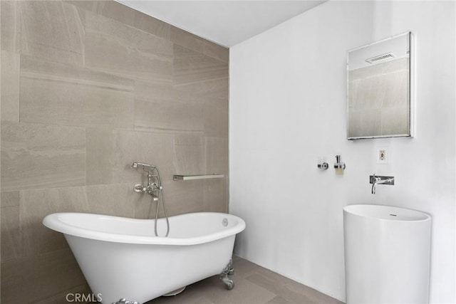 bathroom with a bathing tub